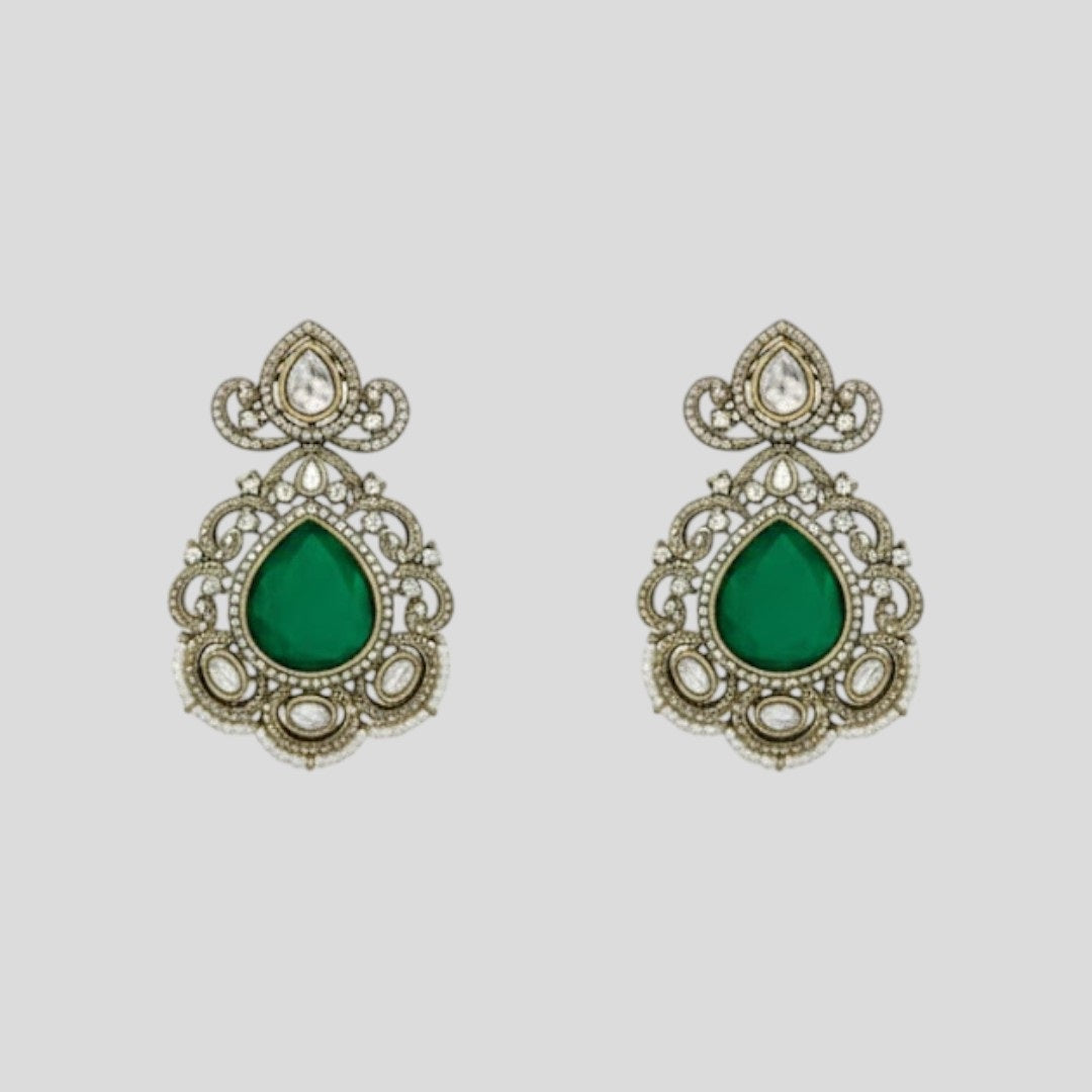 “Premium Polki Kundan necklace set with emerald green stones and matching earrings for bridal and wedding wear.”