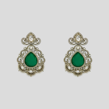 “Premium Polki Kundan necklace set with emerald green stones and matching earrings for bridal and wedding wear.”