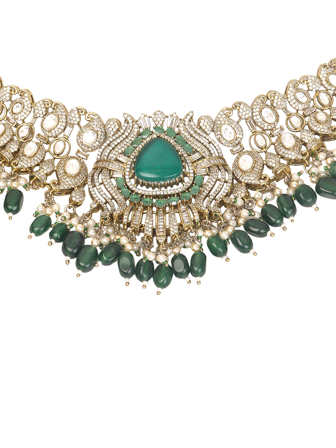 Detailed gold-toned statement necklace with intricate white stone embellishments and a prominent green teardrop centerpiece, finished with dangling green beads and pearls, paired with matching ornate drop earrings, displayed on a plain light background.