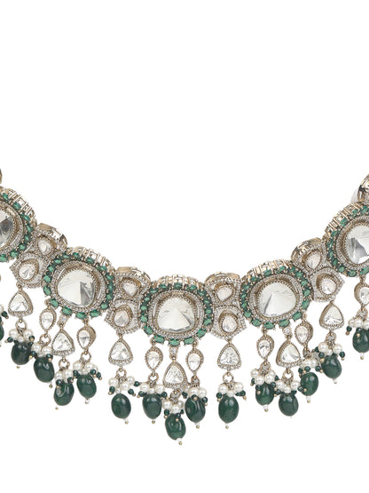 Elegant gold-tone choker necklace set with large mirror-polished stones, green bead accents, and pearl detailing, paired with matching dangling earrings