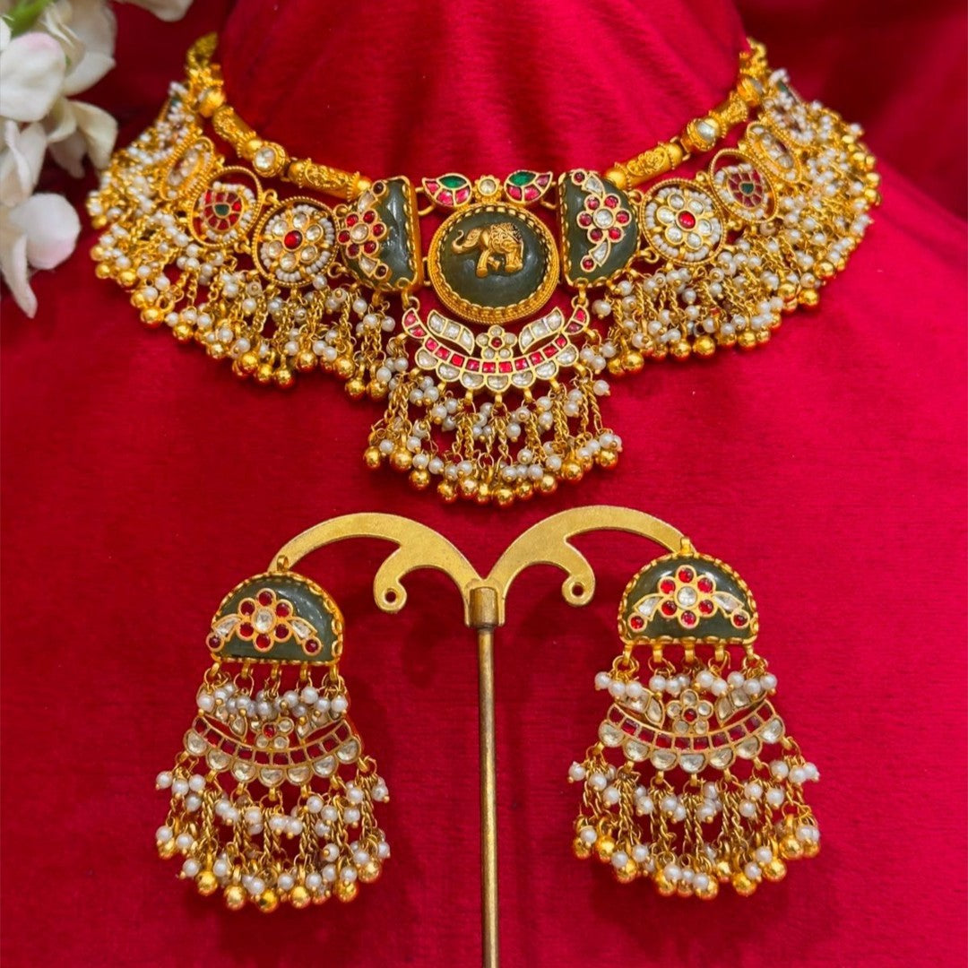 "Antique gold meenakari choker necklace set with elephant motif and matching pearl jhumka earrings, traditional bridal jewellery"