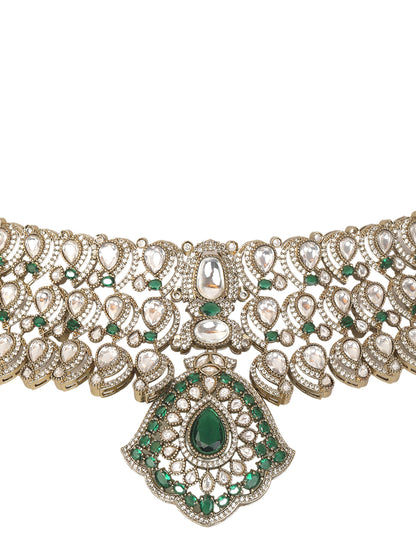 Traditional Kundan choker necklace set with green stones and matching earrings