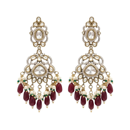 Antique gold Kundan Chandbali earrings with ruby bead drops, pearl clusters, and traditional bridal design for women.