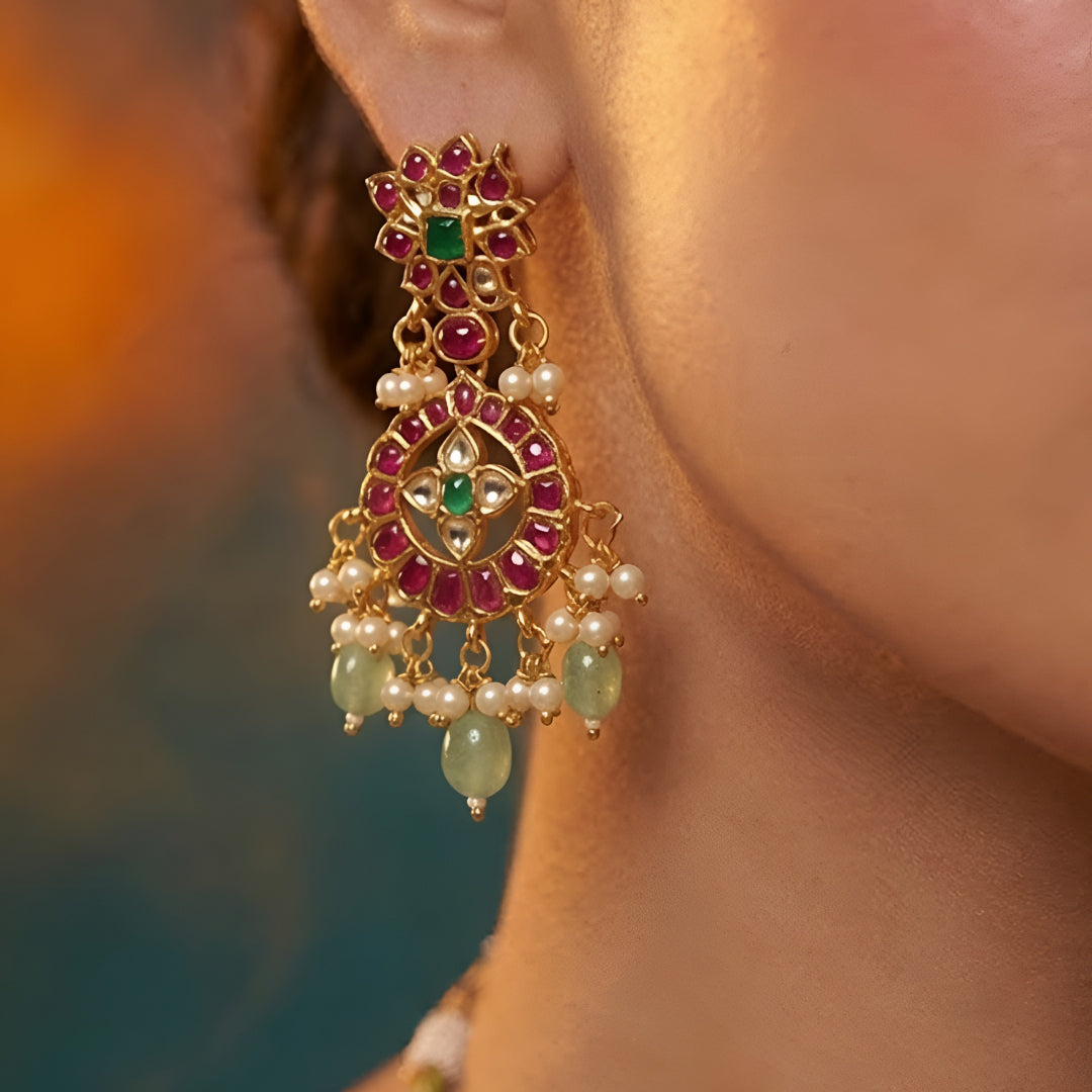 Traditional Kundan choker necklace set with ruby stones, green bead drops, gold finish, and matching earrings for bridal and wedding wear.
