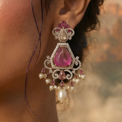 Royal pink Kundan bridal choker necklace set with matching earrings featuring white Kundan stones, floral detailing, pink statement stones, and pearl drop accents.