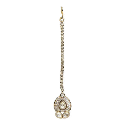 Elegant gold-plated Kundan pearl maang tikka with teardrop stone and crystal detailing for bridal and festive wear.