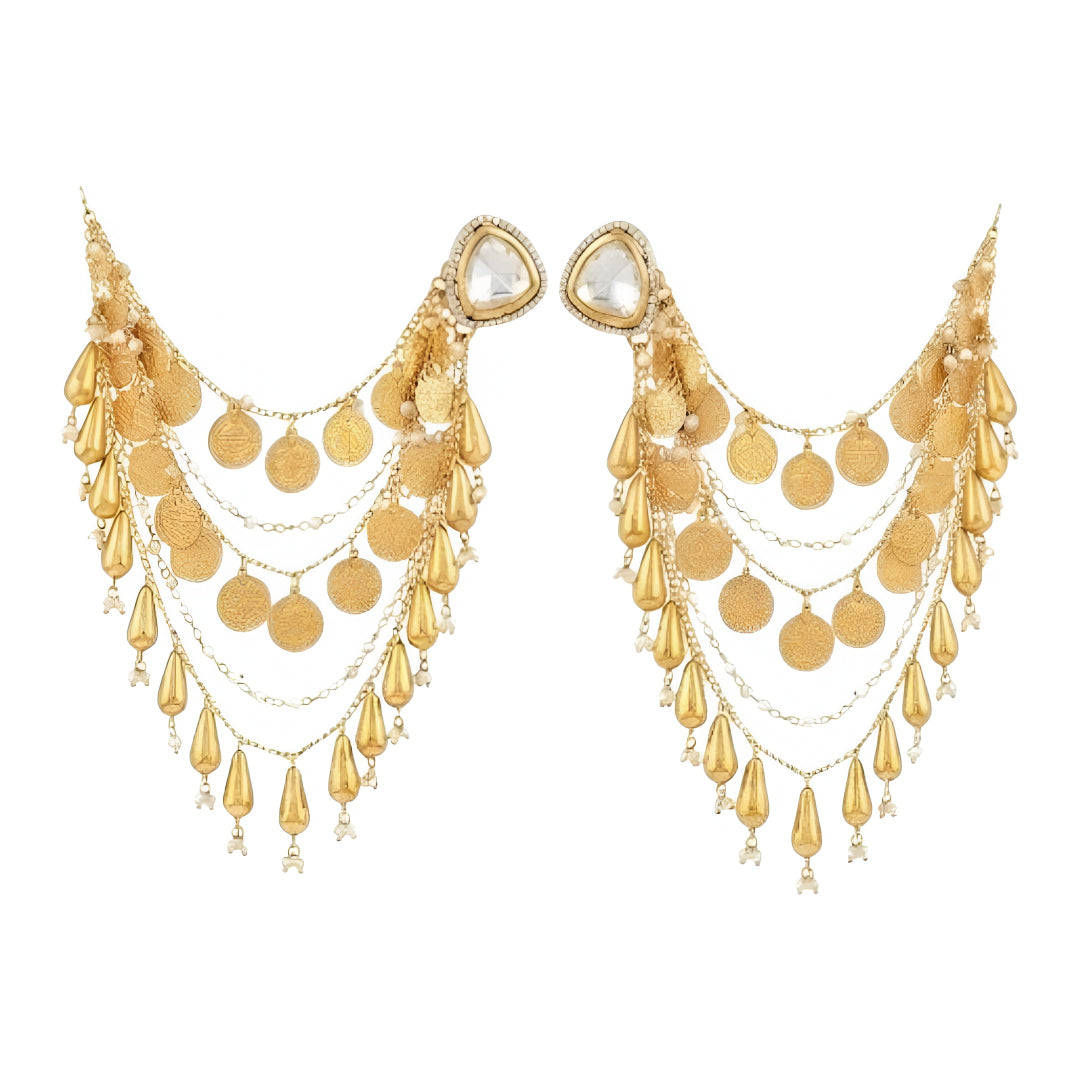 Gold plated Polki ear cuff chain earrings with layered coin charms, tassel drops and pearl accents for bridal and wedding wear.