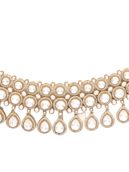 Gold-plated Kundan choker necklace set with teardrop stones and matching earrings for bridal and wedding wear