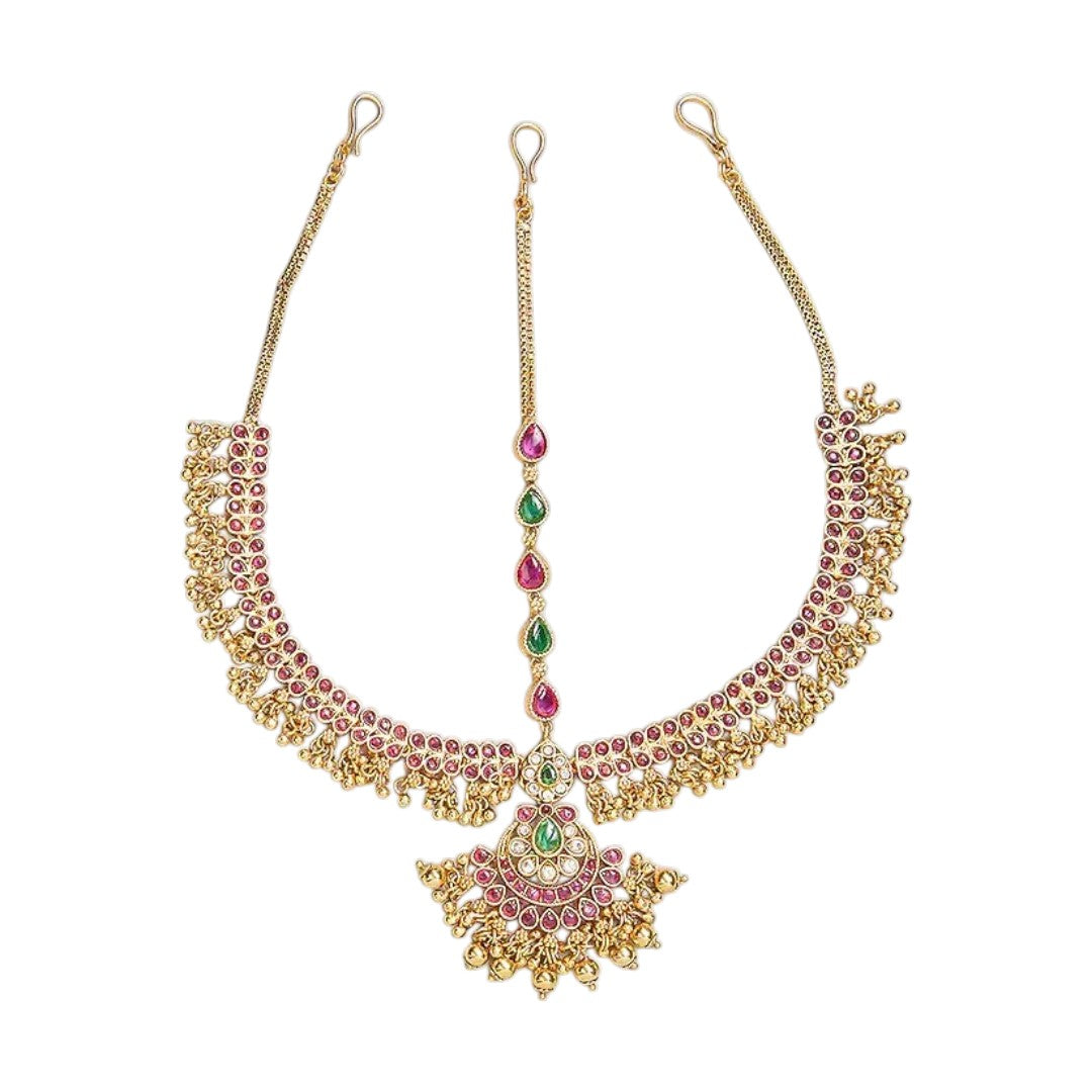 Traditional gold-plated Matha Patti with pink and green Kemp stones and matching maang tikka, perfect for bridal and festive wear.