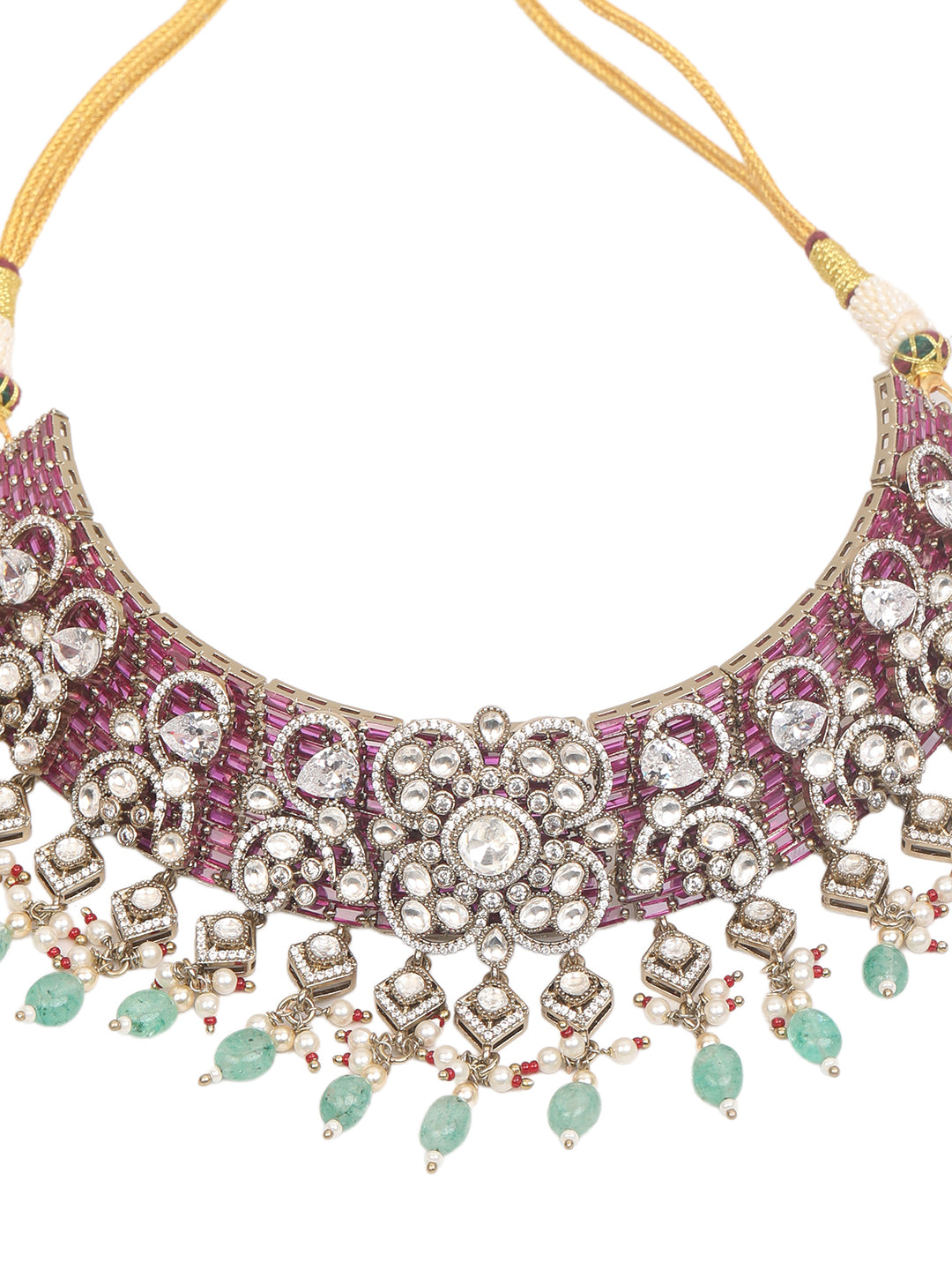 Kundan bridal necklace set with pink stones, green bead drops, and matching statement earrings in gold tone