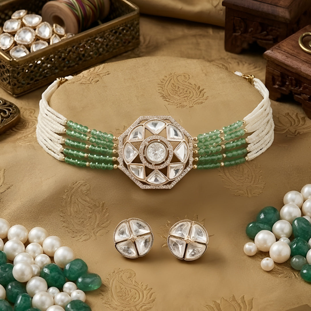 Mint green beaded Kundan choker necklace set featuring a geometric gold-toned centerpiece with matching stud earrings on a white background.