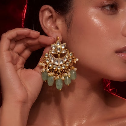"Woman wearing gold Kundan choker necklace set with green beaded drops and matching chandbali earrings, bridal jewellery"