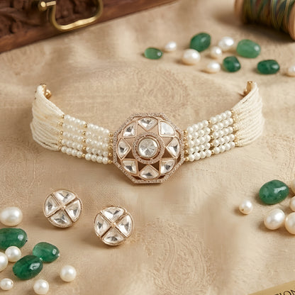 Elegant pearl kundan choker necklace set with matching stud earrings featuring gold-tone finish and traditional ethnic design for women.