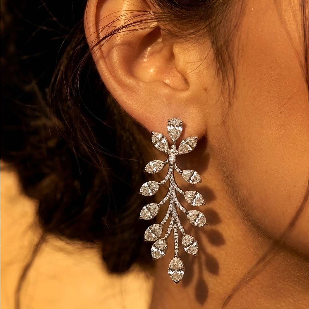 Elegant leaf design diamond necklace set with matching earrings in white gold finish, luxury bridal jewelry for weddings and special occasions.