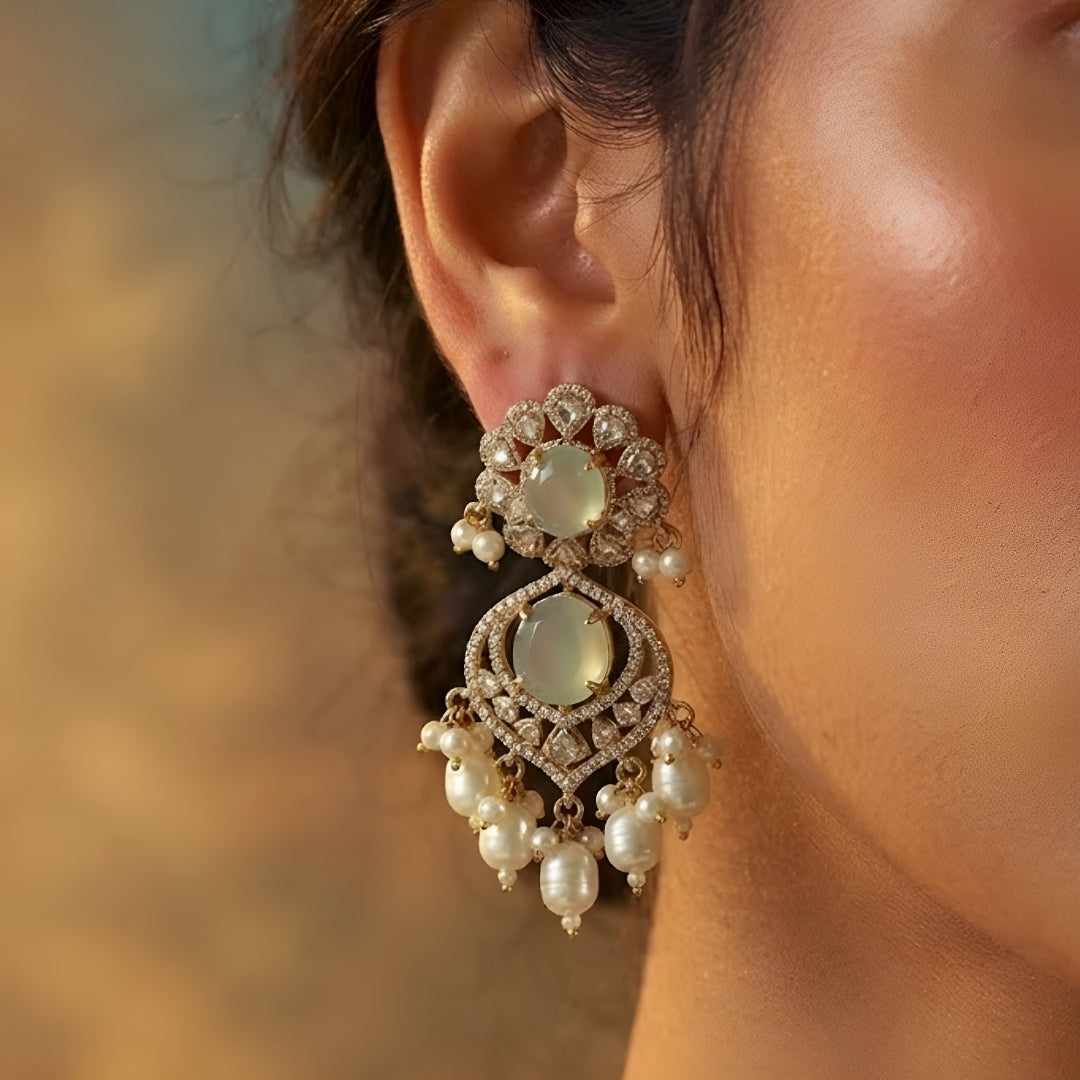 Mint green Kundan pearl choker necklace set with matching dangling earrings in gold plating by Auraa Trends