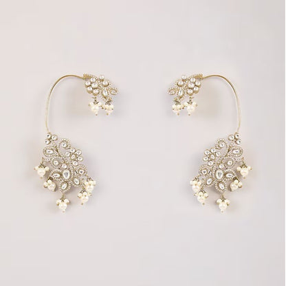 Gold-plated crystal and pearl statement earrings with floral design and dangling pearl accents for weddings and party wear.
