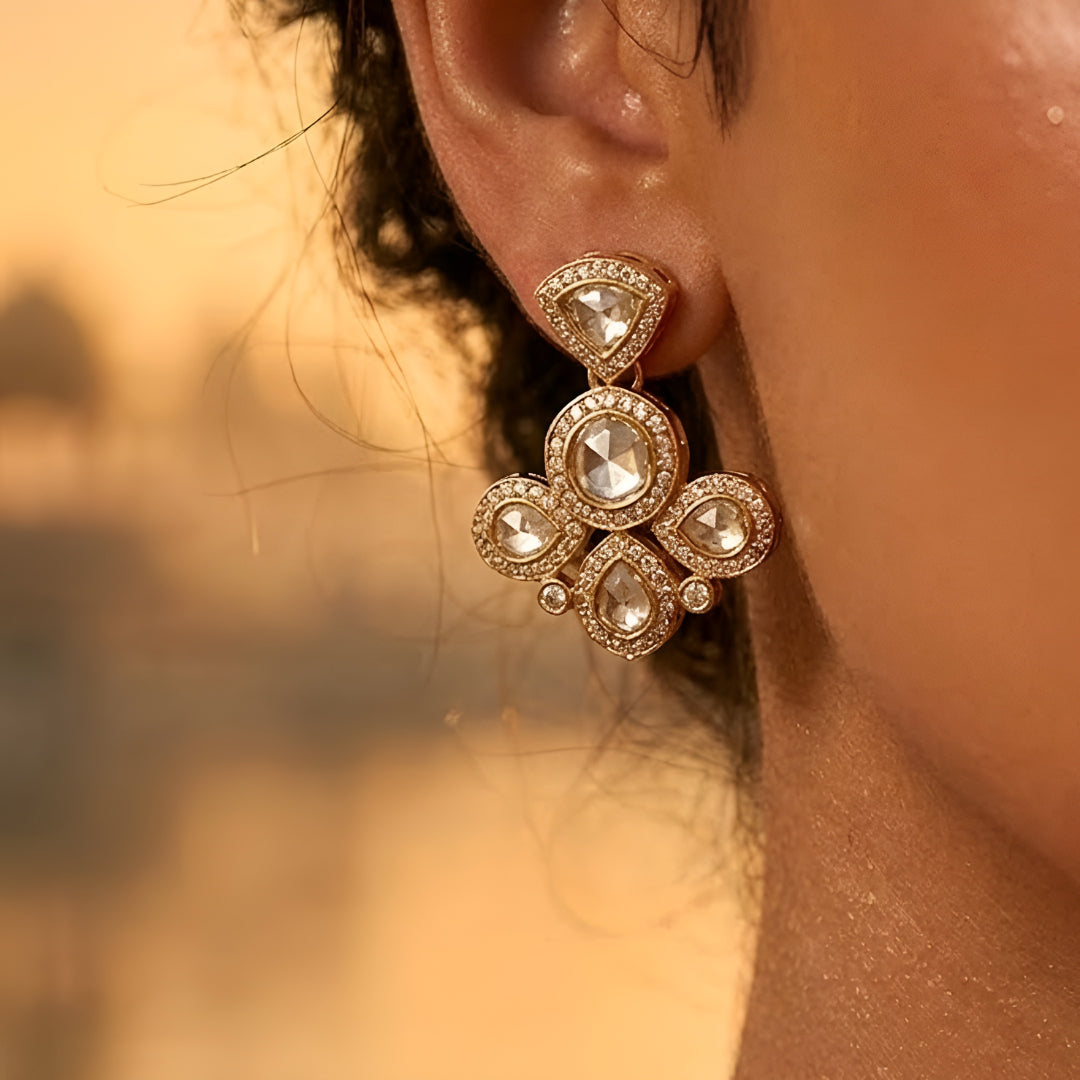 Gold-tone floral crystal pendant necklace with matching crystal earrings jewelry set featuring sparkling clear stones and elegant flower design.