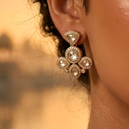 Gold-tone floral crystal pendant necklace with matching crystal earrings jewelry set featuring sparkling clear stones and elegant flower design.