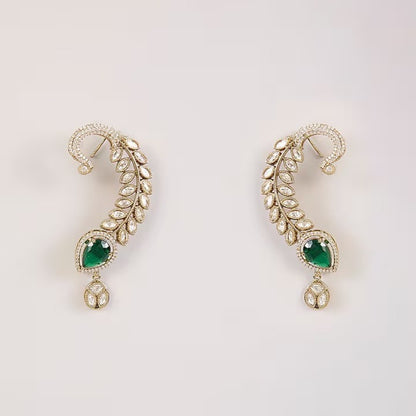 Gold-plated leaf design ear cuff earrings with emerald green teardrop stones and sparkling crystal embellishments for women.