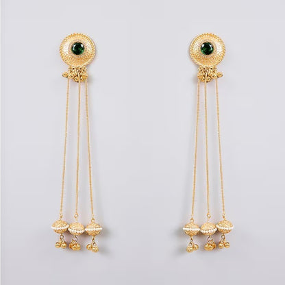 Traditional gold plated long chain tassel earrings with green stone stud and pearl jhumka drops for women, ideal for bridal, wedding, festive, and ethnic wear.