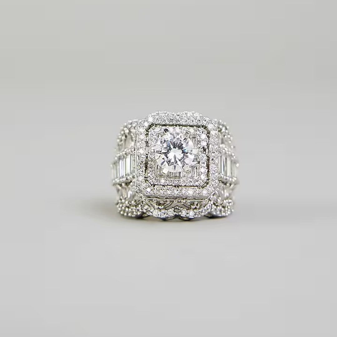 Luxury silver-tone cubic zirconia statement ring with princess-cut center stone and baguette crystal accents