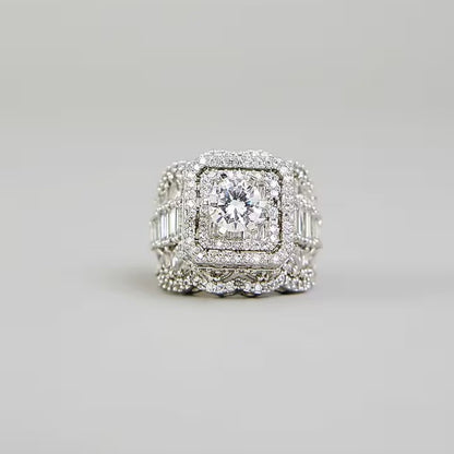 Luxury silver-tone cubic zirconia statement ring with princess-cut center stone and baguette crystal accents