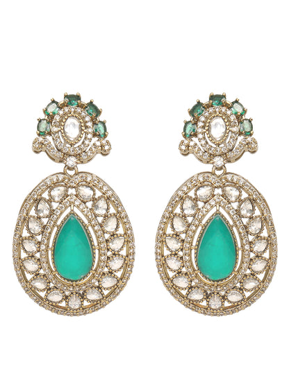 Gold-tone choker necklace set with intricate kundan-style detailing, highlighted by a large teardrop green stone centerpiece and matching drop earrings.