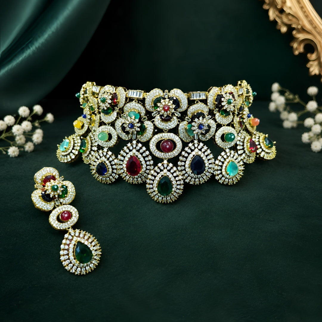 Luxury multicolor bridal choker necklace set with matching earrings featuring gold plating and premium CZ stones for wedding and party wear.