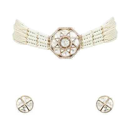 Elegant pearl kundan choker necklace set with matching stud earrings featuring gold-tone finish and traditional ethnic design for women.