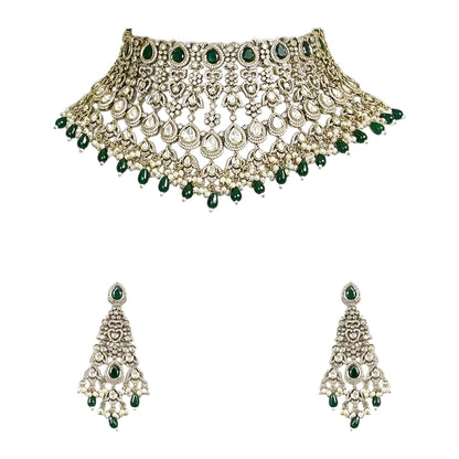 Green Kundan Polki bridal choker necklace set with intricate lattice design, pearl embellishments, green teardrop beads, and matching statement earrings.