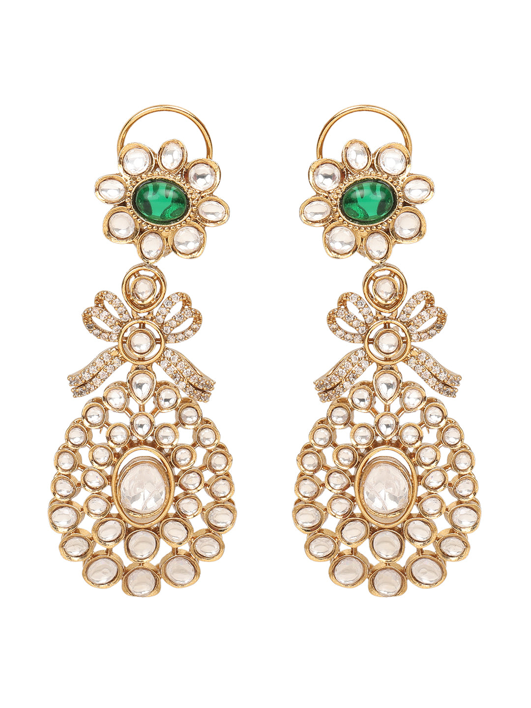Gold-toned necklace with a braided cord and adjustable tassel tie, featuring intricate white stone detailing with oval green gemstones and multiple dangling teardrop motifs, paired with matching drop earrings, displayed on a plain light background.