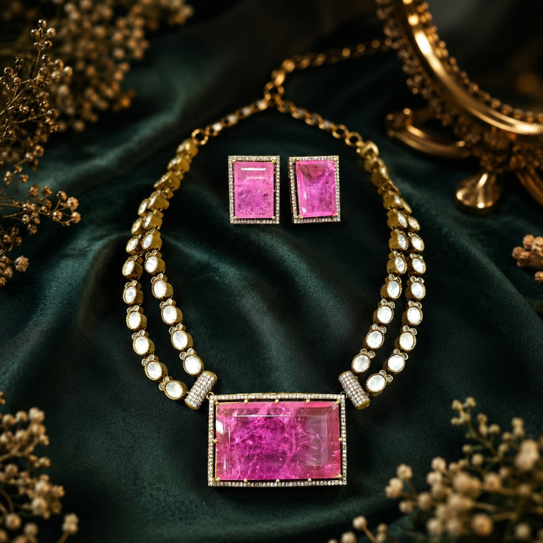 Pink crystal pendant necklace set with matching rectangular earrings in gold plating by Auraa Trends