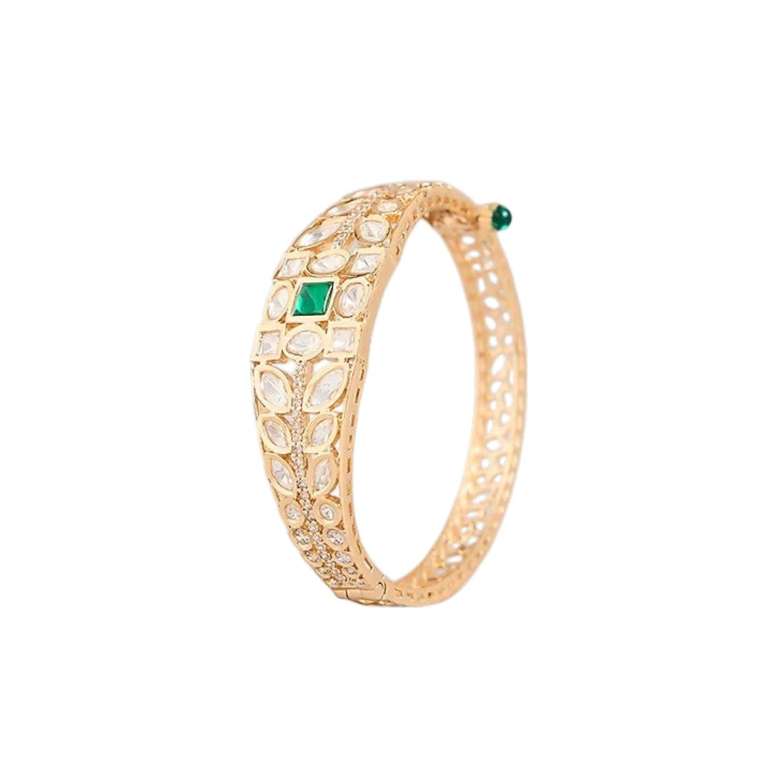 Green stone AD studded gold tone designer kada bracelet with intricate leaf detailing
