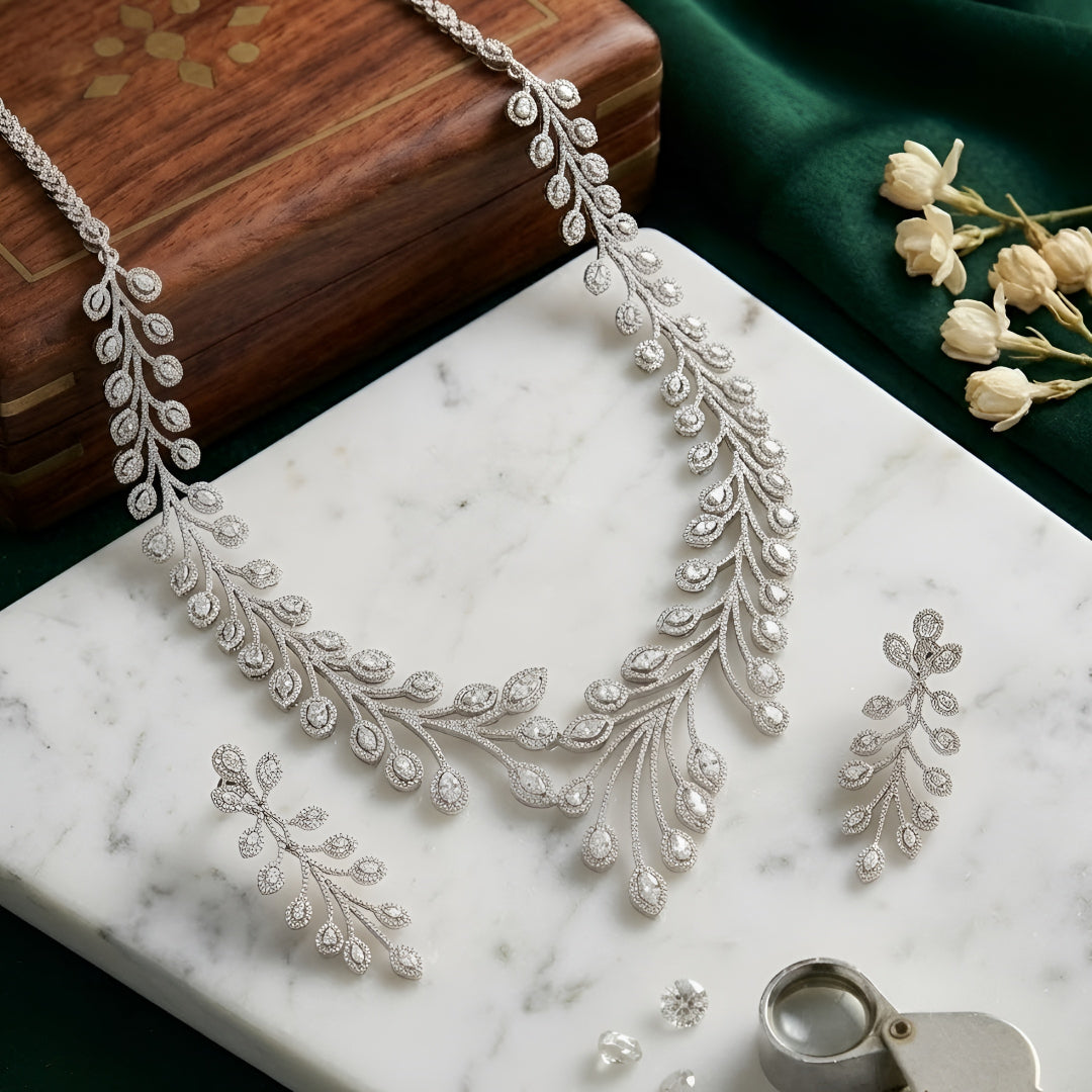 Elegant leaf design diamond necklace set with matching earrings in white gold finish, luxury bridal jewelry for weddings and special occasions.