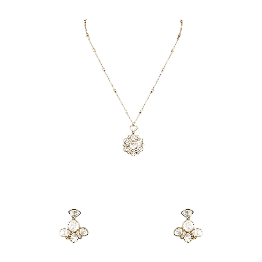 Gold-tone floral crystal pendant necklace with matching crystal earrings jewelry set featuring sparkling clear stones and elegant flower design.