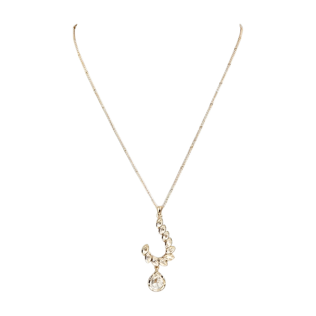 Gold-toned leaf design pendant necklace set with teardrop crystal pendant and matching drop earrings on a white background.