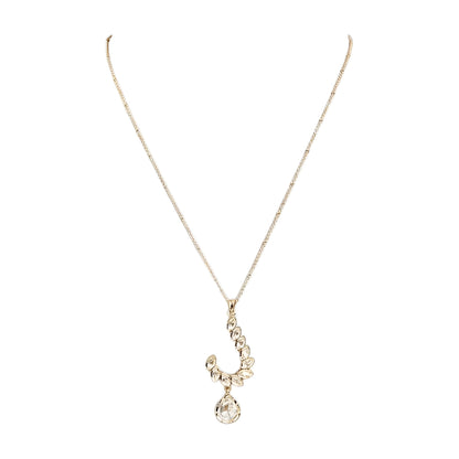 Gold-toned leaf design pendant necklace set with teardrop crystal pendant and matching drop earrings on a white background.