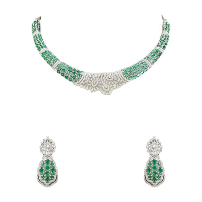 Silver-toned emerald green crystal choker necklace set featuring sparkling stone detailing and matching statement drop earrings on a white background.