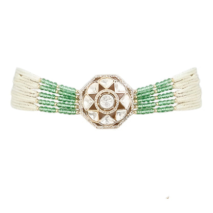 Mint green beaded Kundan choker necklace set featuring a geometric gold-toned centerpiece with matching stud earrings on a white background.