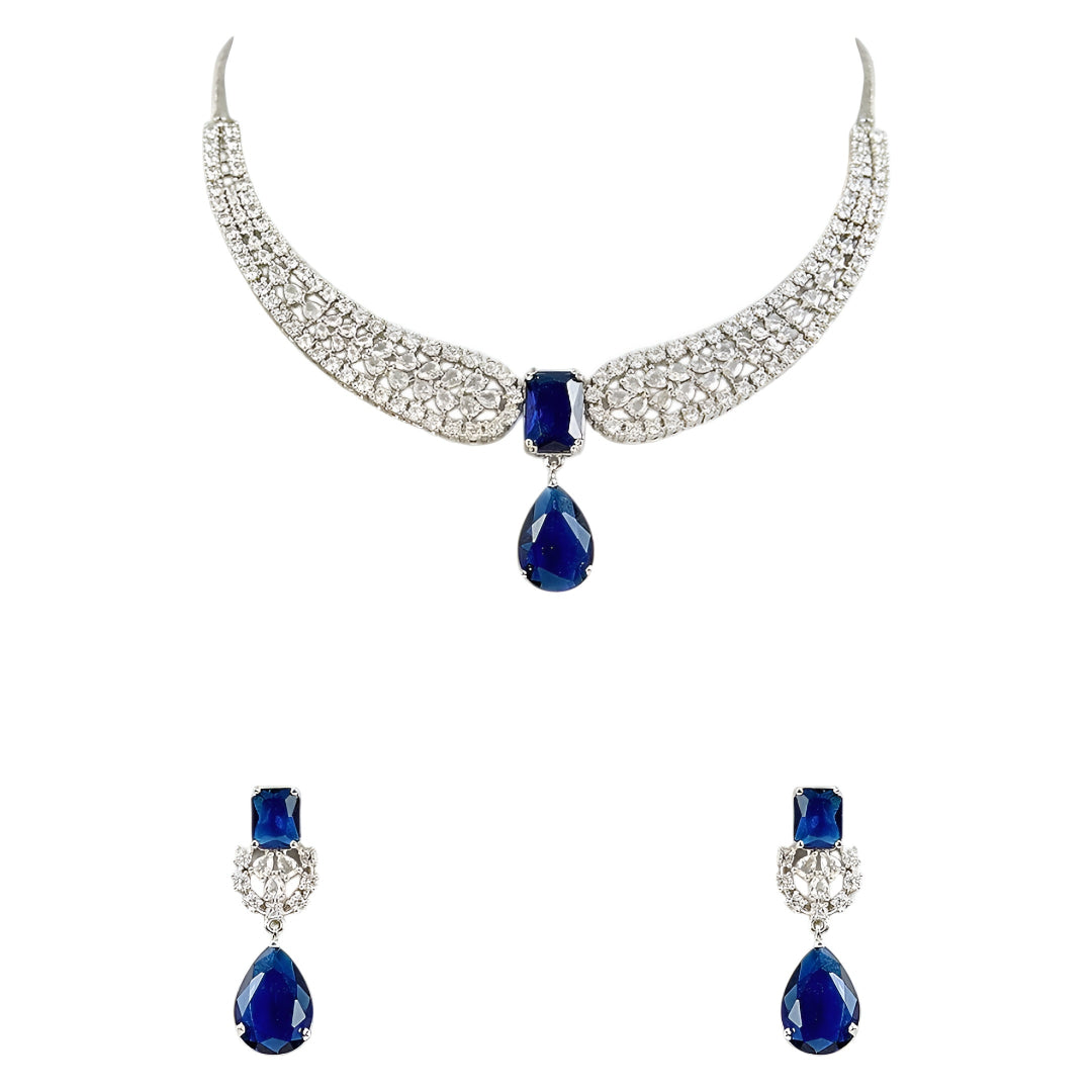 Elegant blue sapphire crystal choker necklace set with zircon-studded silver finish and matching drop earrings for women.