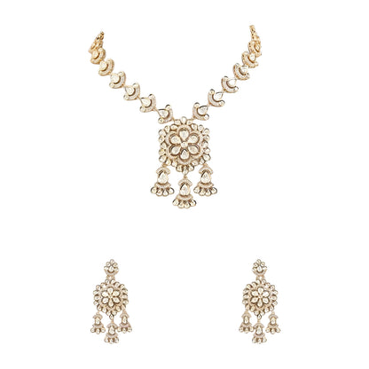 Gold-tone Kundan floral necklace set featuring a statement pendant with dangling accents and matching drop earrings on a white background.