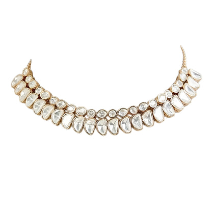 Luxury gold-tone Kundan statement necklace with clear uncut stones in an elegant crescent design for bridal and wedding jewelry.