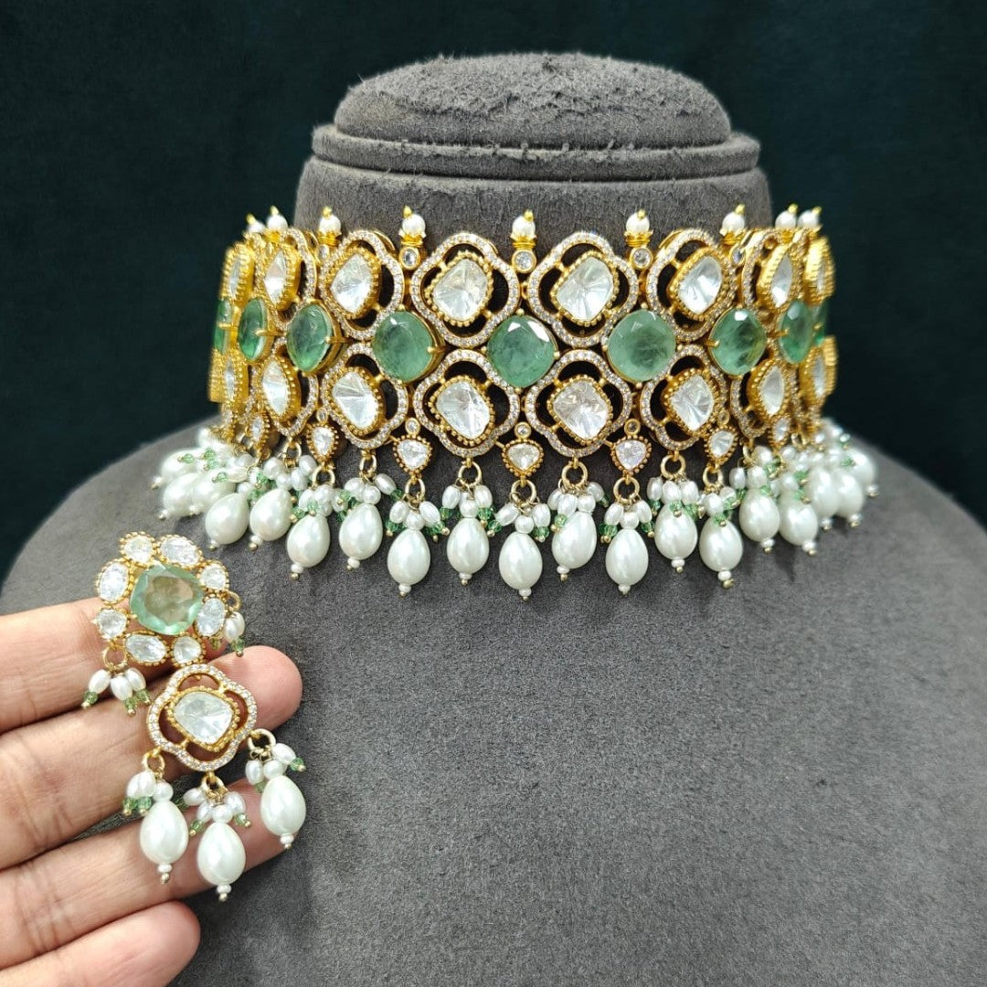 Mint green Kundan pearl choker necklace set with matching dangling earrings in gold plating by Auraa Trends