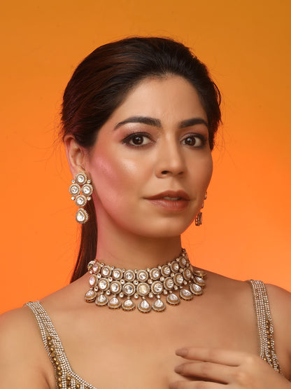 Gold-plated Kundan choker necklace set with teardrop stones and matching earrings for bridal and wedding wear