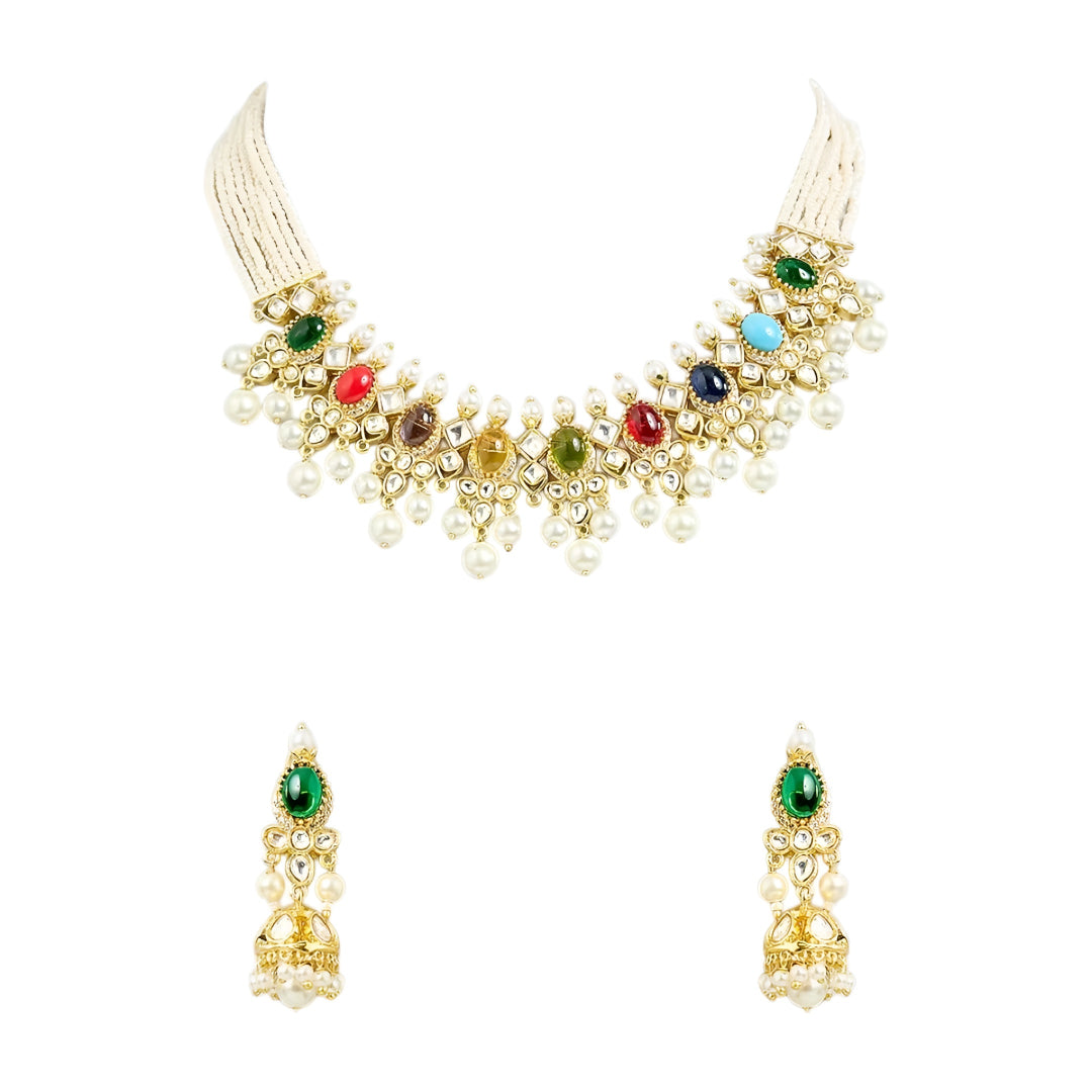 Gold-toned Navratna Kundan choker necklace set with multicolored stones, pearl drops, and matching green stone jhumka earrings on a white background.