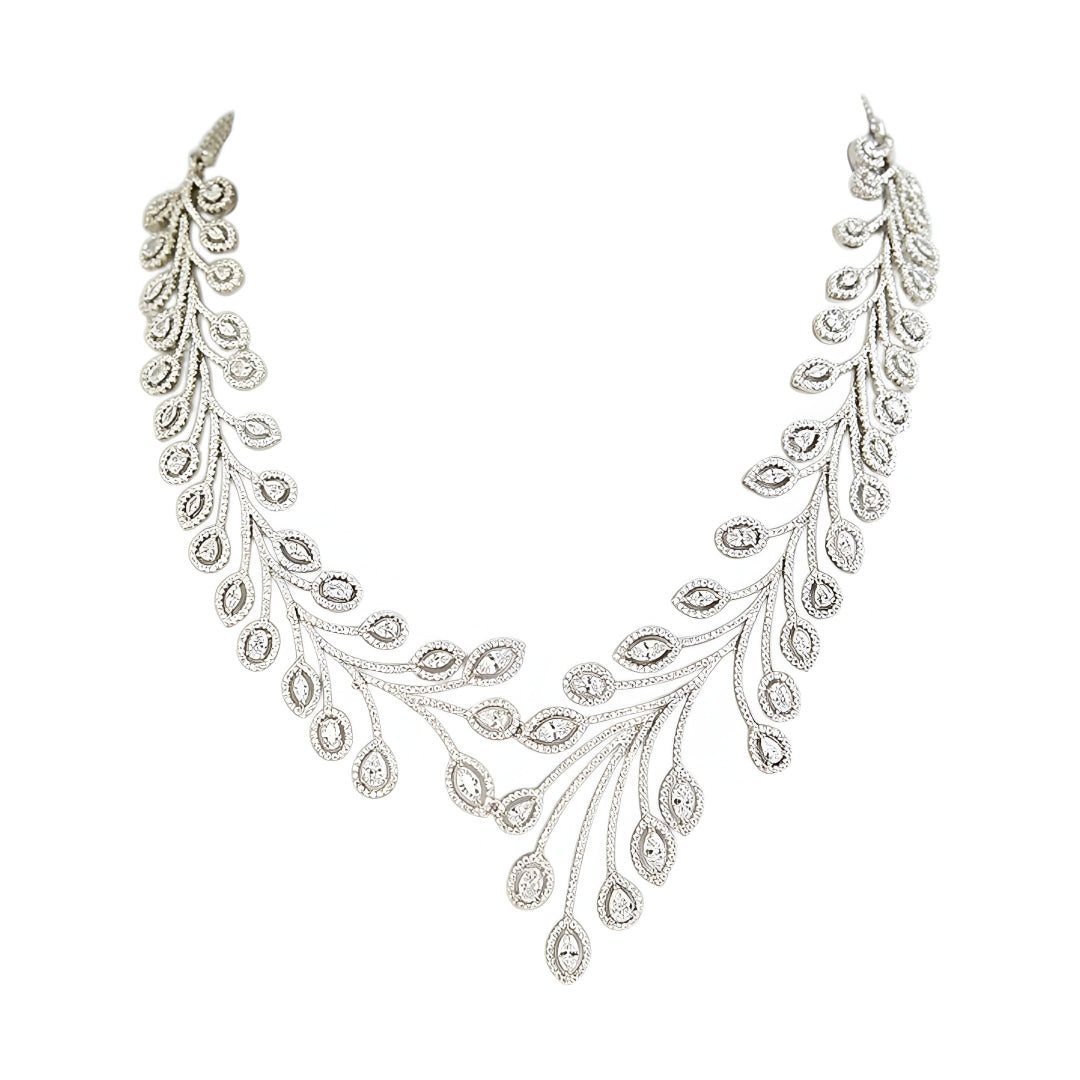 Elegant leaf design diamond necklace set with matching earrings in white gold finish, luxury bridal jewelry for weddings and special occasions.