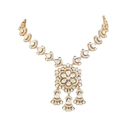 Gold-tone Kundan floral necklace set featuring a statement pendant with dangling accents and matching drop earrings on a white background.