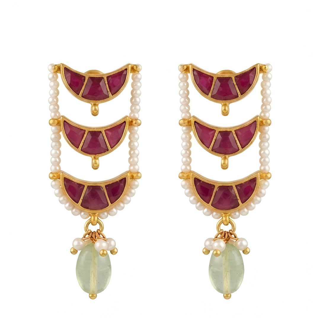 "Layered Kundan choker necklace and earring set in maroon gold with pearl and green bead drops, bridal jewellery styled on model"