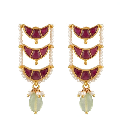 "Layered Kundan choker necklace and earring set in maroon gold with pearl and green bead drops, bridal jewellery styled on model"