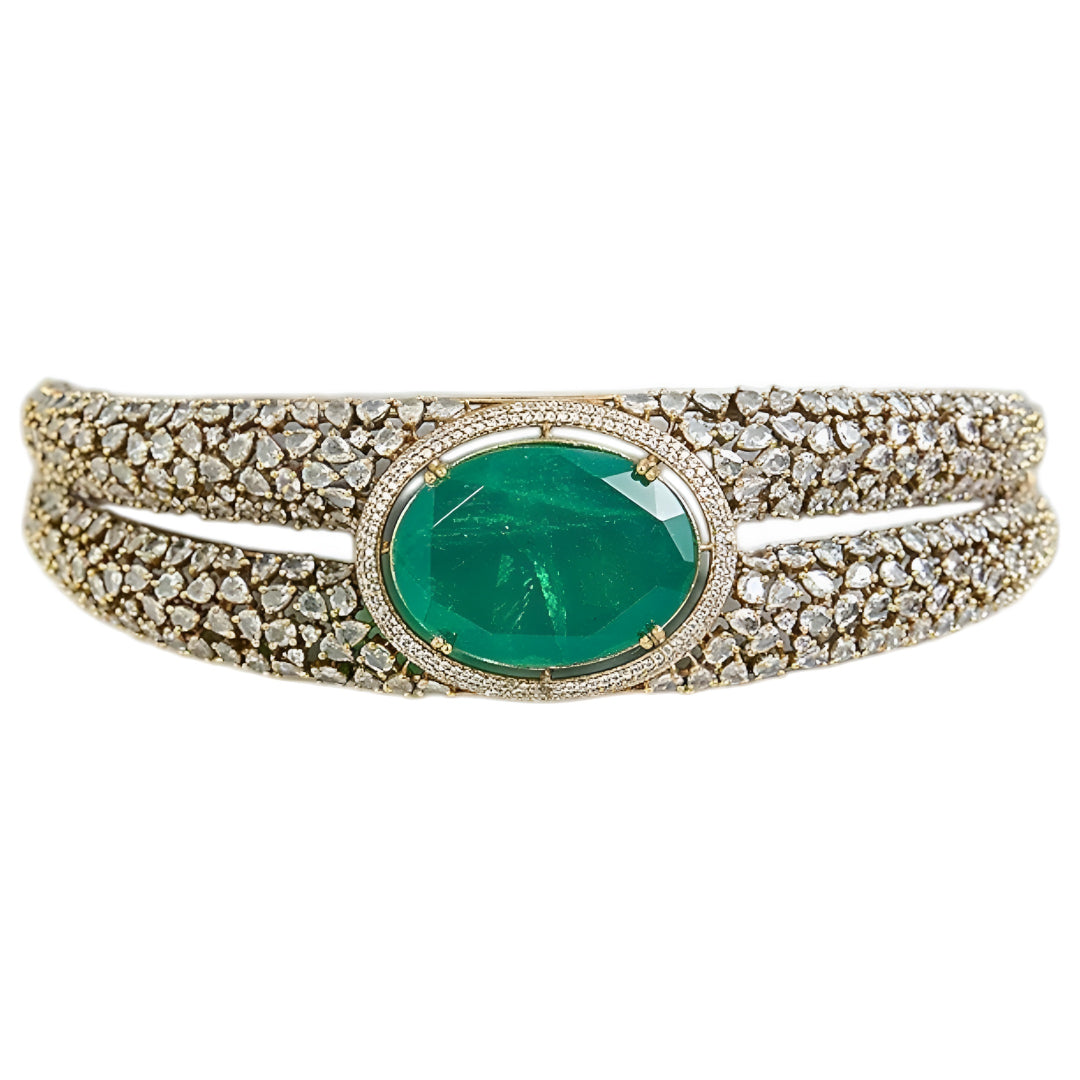 Luxury emerald green stone choker necklace set with sparkling Polki-inspired crystals and matching drop earrings for bridal and wedding jewelry.